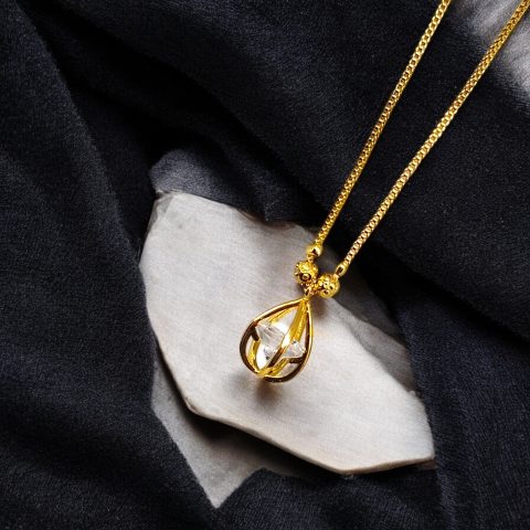 Celebrate your special occasions with 24K Gold Plated Oval Cage Pendant and chain with AD.